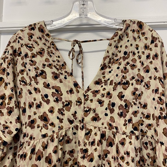 Entro Mod Leopard Print women’s top Blouse size small
Length 25”
Pit to pit 21” - Picture 3 of 7